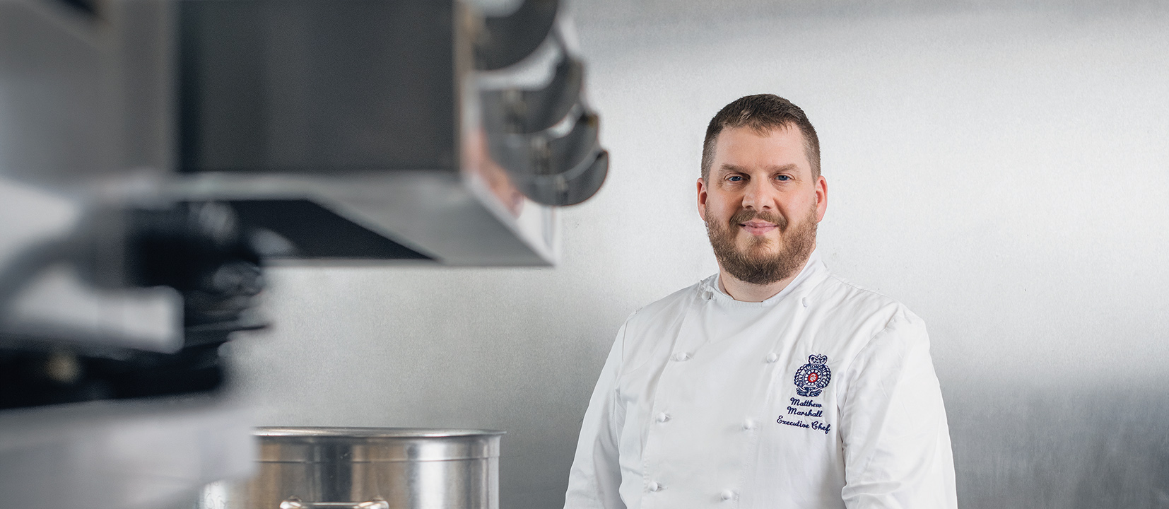 Matthew in kitchen promotion image